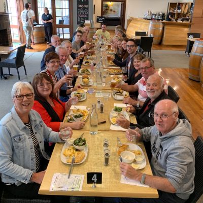 a group of people sitting at a table